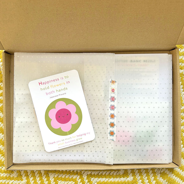 Miniature Punch Needle Flower Kit wrapped in tissue paper with Happiness thank-you card and holographic flower washi tape